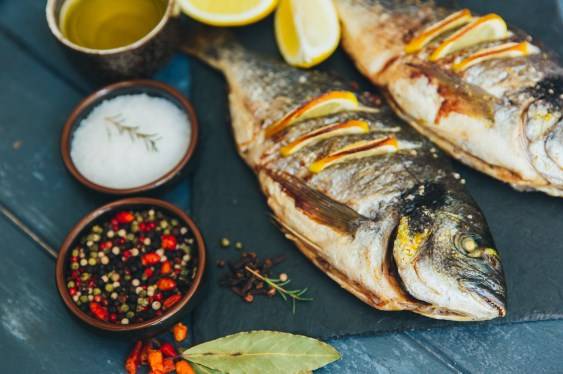 grilled fish with fresh herbs and spices